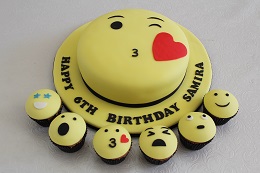 emoji birthday cake and cupcakes